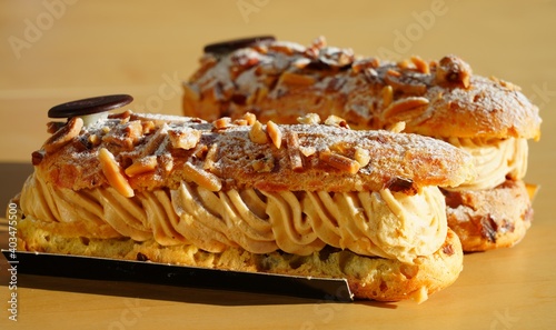 Two fresh Paris-Brest praline choux pastry cakes