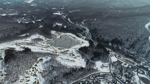 Aerial view to Stowe Mountain Ski Resort in Vermont, USA. Early winter 2020 season.