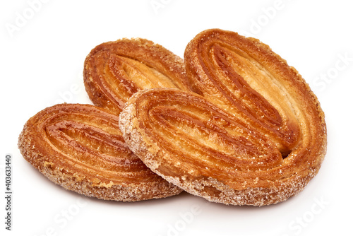 Sugared puff pastry cookies, isolated on white background