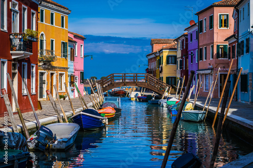 Colorful Houses At A Canal With Boats On The Fishing Island Burano In The Lagoon Of Venice