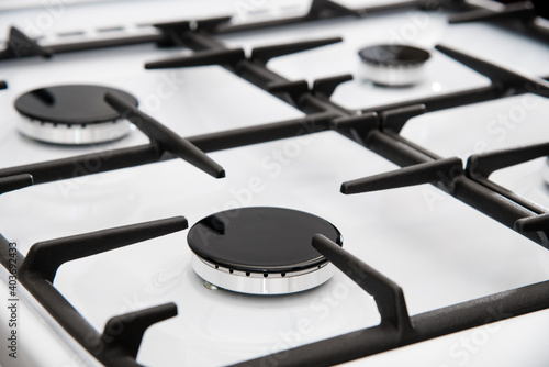 Gas oven hob with gas burners and grate