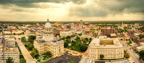 Aerial panorama of the Illinois State Capitol dome and Springfield skyline under a dramatic sunset. Springfield is the capital of the U.S. state of Illinois and the county seat of Sangamon County