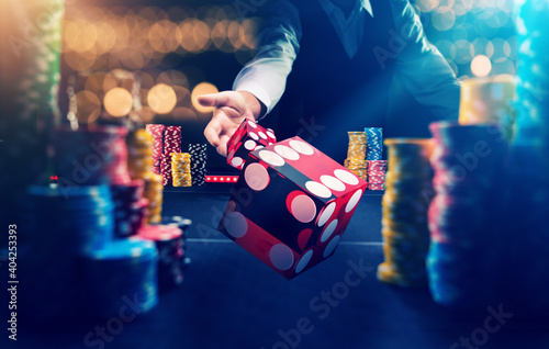 Man gambling at the craps table at the casino