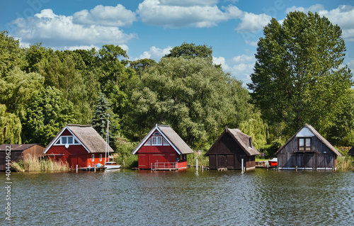 Wooden boathouses in Mueritz National Park, Mecklenburg Lake District,Germany. Mecklenburg-Vorpommern, Germany.