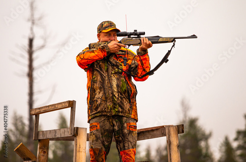 Hunter outdoor in the wilderness during hunting season