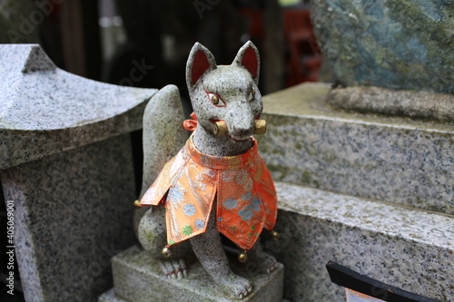 fox god statue in japan, kyoto, in fushimi inari tisha shrine