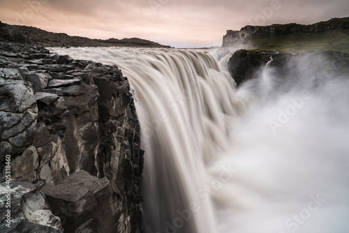 Dettifoss waterfall in pink evening glow, North Iceland