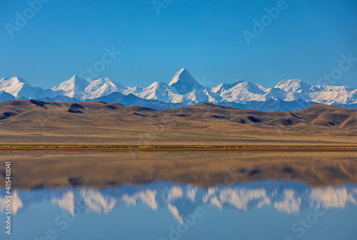 reflection of a mountain peak in the lake, Khan Tengri peak