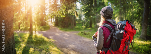 Woman hiking and going camping in nature