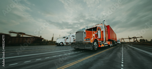 The truck runs on the highway with speed.