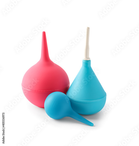 Different enemas on white background. Medical treatment