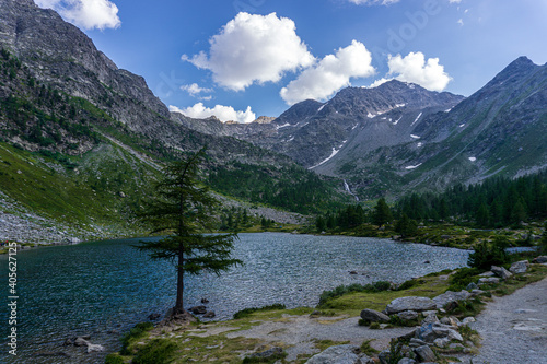 The nature and landscape of the alps seen from the shores of Lake Arpy, in the Aosta Valley, near the town of La Thuile, Italy - August 2020.