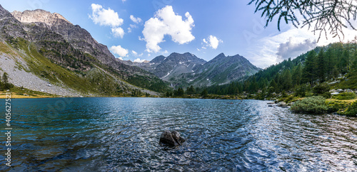 The nature and landscape of the alps seen from the shores of Lake Arpy, in the Aosta Valley, near the town of La Thuile, Italy - August 2020.