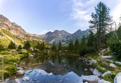 The nature and landscape of the alps seen from the shores of Lake Arpy, in the Aosta Valley, near the town of La Thuile, Italy - August 2020.