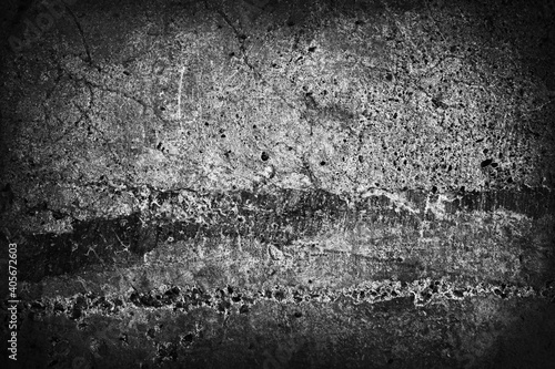 Black white grunge background. Old concrete wall texture backdrop. Cracked damaged wall. Distressed gothic dark rough abstract background with copy space for your design.