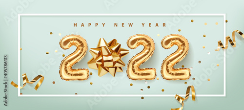 2022 golden decoration holiday on blue background. Gold foil balloons numeral 2022 with realistic festive objects,, glitter gold confetti and serpentine. Shiny party background. Horizontal banner