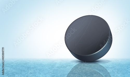 Hockey puck background on an ice rink with blank copy space as a winter team sport 