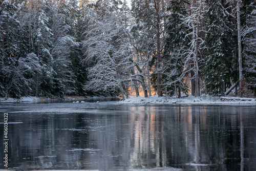 Cold morning in a wintry river landscape. Farnebofjarden national park in north of Sweden.
