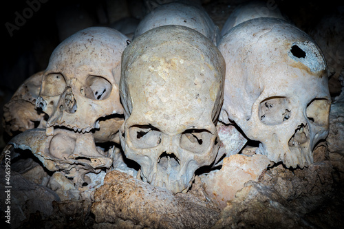 Skulls in cannibal skull cave in Papua New Guinea 