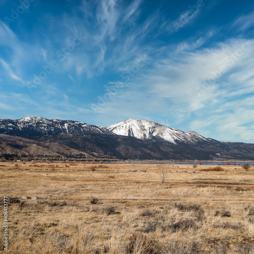 Northern Nevada desert landscape with a snow covered Slide Mountain as seen from Washoe Valley near Reno.