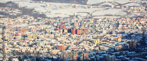 Winter panorama of city houses. ​​Brick houses in the winter.