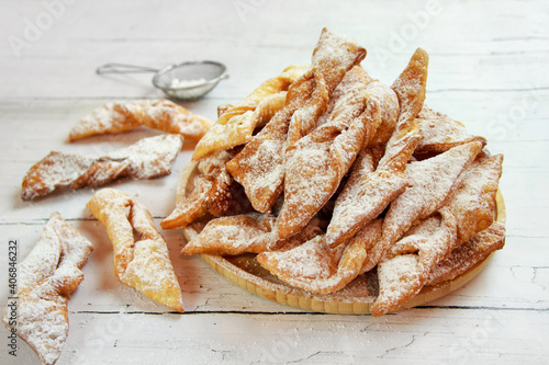 Faworki (angel wings) sprinkled with powdered sugar - traditional Polish carnival delicacy