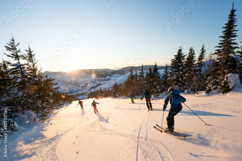 Group of friends skiing in the Chic Chocs in Quebec Canada