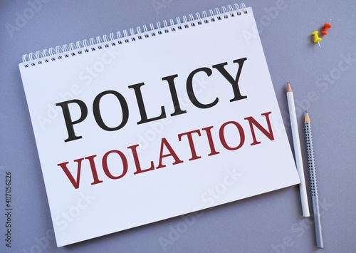 Policy Violation text written on Notebook. Bussines concept meaning the violation of any applicable law or college policy governing the conduct of students as members of the college community.