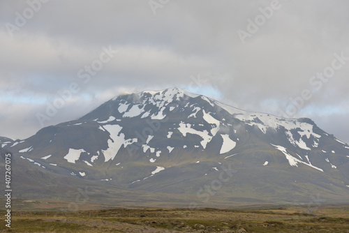 Wild mountain hiding in the clouds in Iceland