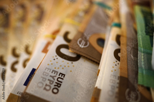 Bundled euro banknotes with selective focus