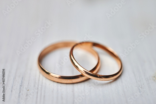 two wedding rings on a wooden surface. preparing for the wedding. close-up, macro