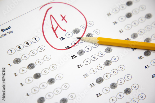 good grade in school on an exam or test, passing a standardize test. 