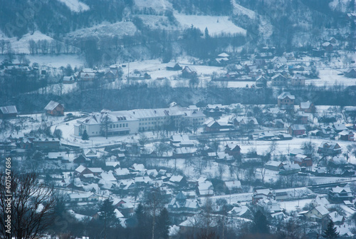 Misty winter morning in mountain village