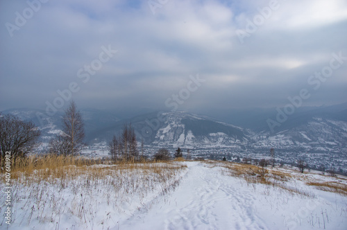 Rural landscape in winter Carpathian mountains
