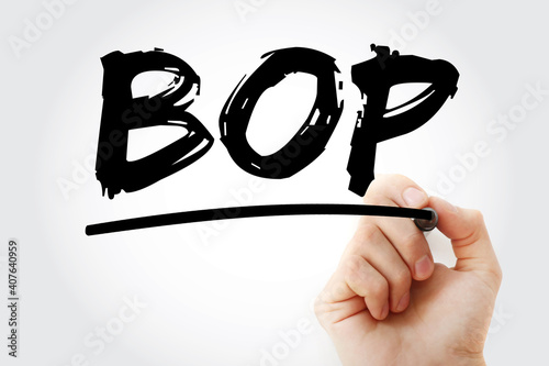 BOP - Bottom of the Pyramid acronym with marker, business concept background