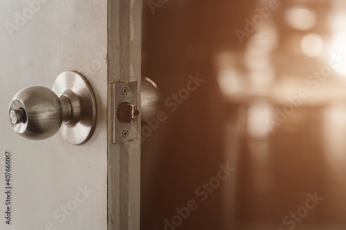 Close-up shot of a dirty doorknob. The doorknob is being found that caused the COVID-19 infection.