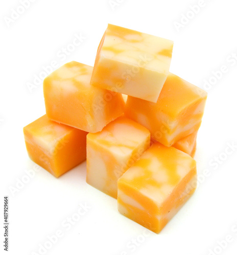 Cubes of Colby Cheese isolated on white