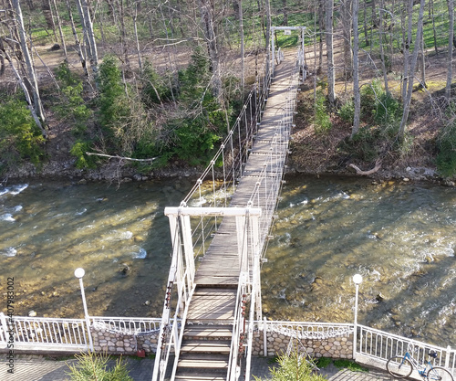 Suspension bridge over the river