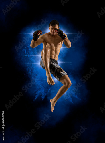 MMA fighter jumping with a knee kick