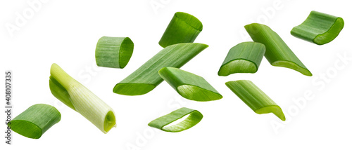 Falling green onion slices, cut chives isolated on white background