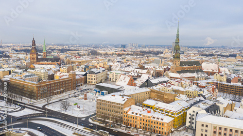 Riga, Latvia, Baltics. Beautiful panoramic aerial view photo from flying drone to Old Riga on a Beautiful Sunny Winter Day. (series)