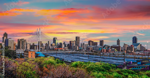 Nelson Mandela Bridge and Johannesburg city at sunset