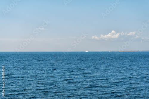 Boats and waves in the sea, hot Crimean summer