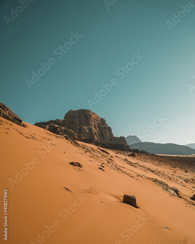 Beautiful sand dunes scenery with rocky hills at Wadi Rum Jordan