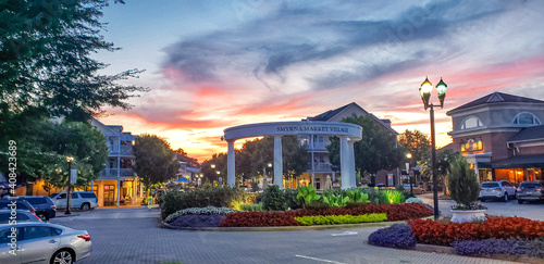 Downtown Smyrna Georgia. Downtown Smyrna Georgia taken at sunset from the street. Shopping and restaurants within an idyllic setting of flowers