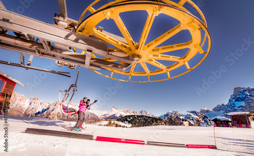  Skiing, winter, snow, sun and fun - kids, boy and girl having fun in the Alps. Child skiing in the mountains. 