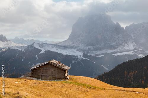 Typical mountain landscape with views of the Sella mountain groups and the Sassolungo mountain range (Langkofel), Dolomites at sunset, South Tyrol