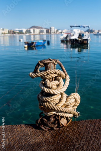 Sailor knots at the harbor berth