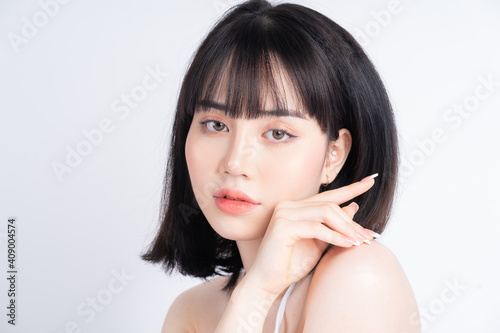 Attractive young Asian woman with fresh skin. Face care, facial treatment, , woman beauty skin isolated on white background. cosmetology, beauty skin and cosmetic concept