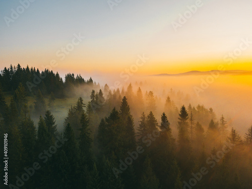 Majestic spring sunset in the mountains landscape.Sunset with sunny beams. Carpathian